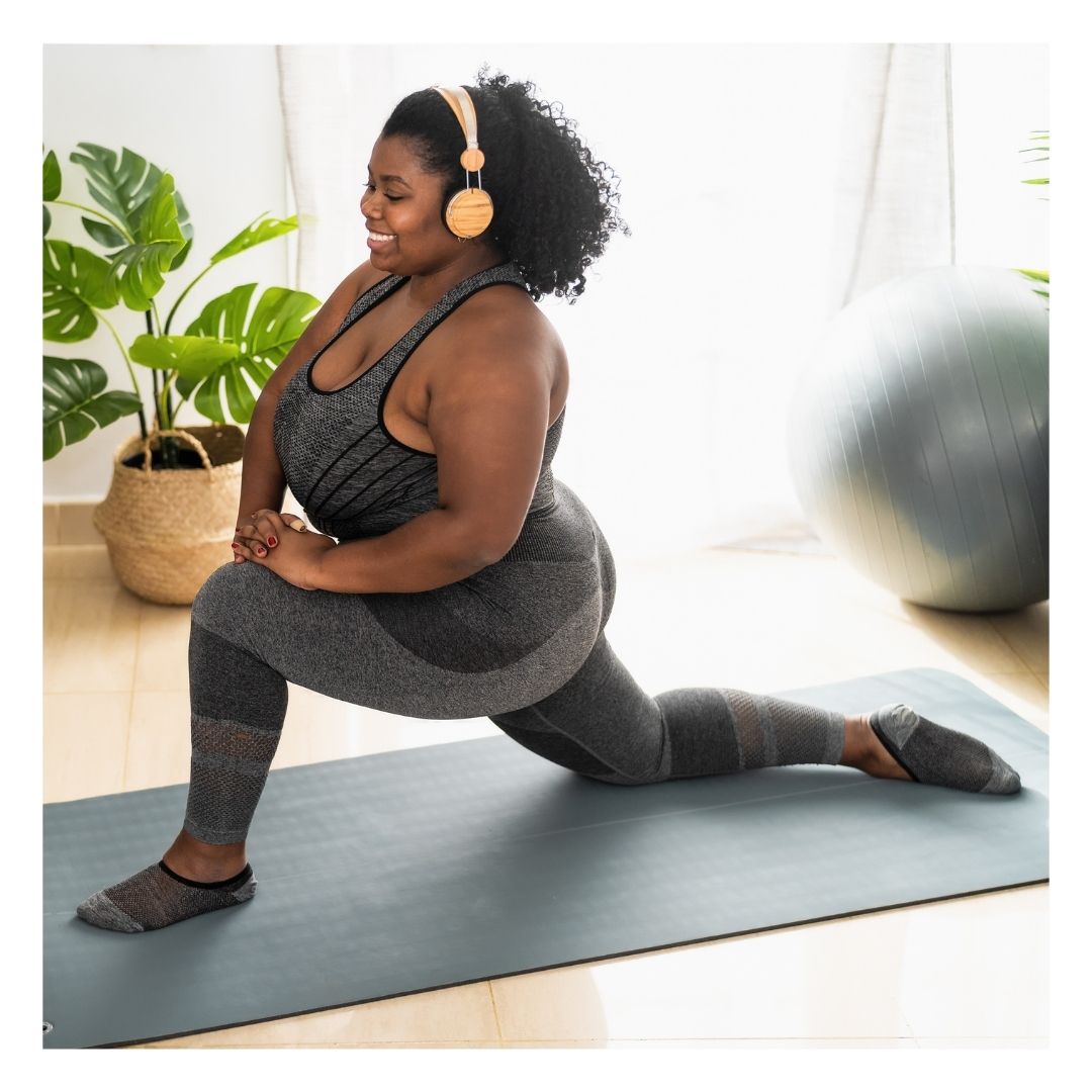 woman exercising at home