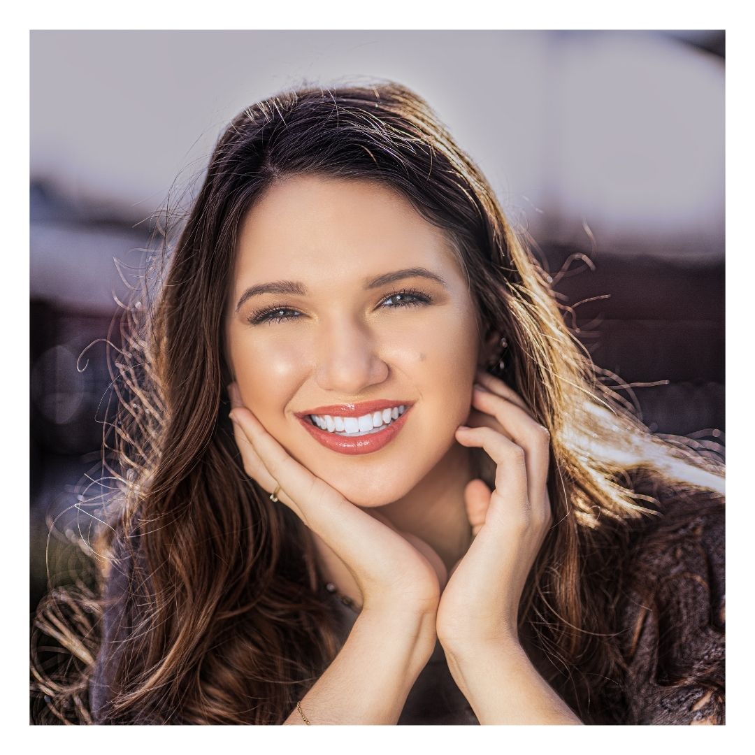 woman with glowing skin and no acne
