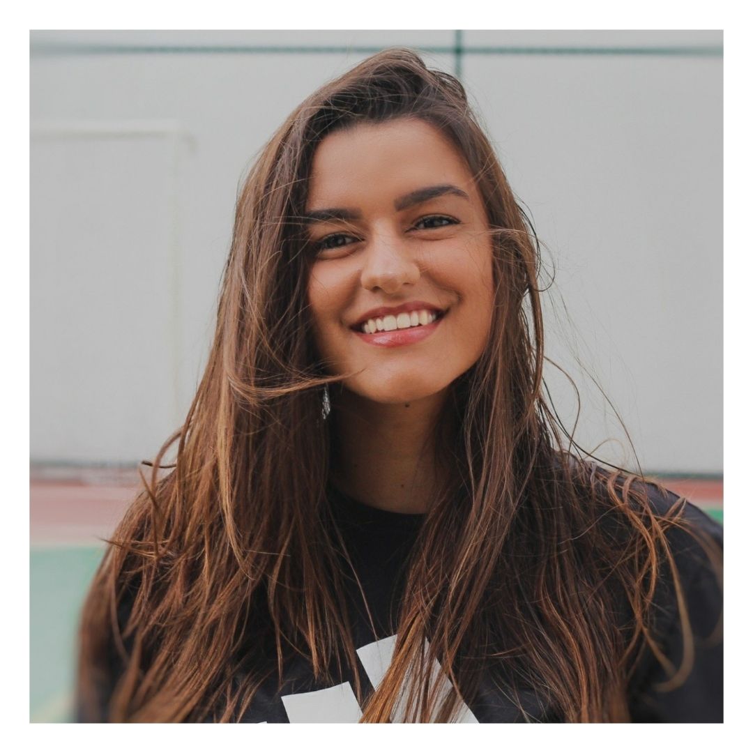 woman smiling after indoor tanning