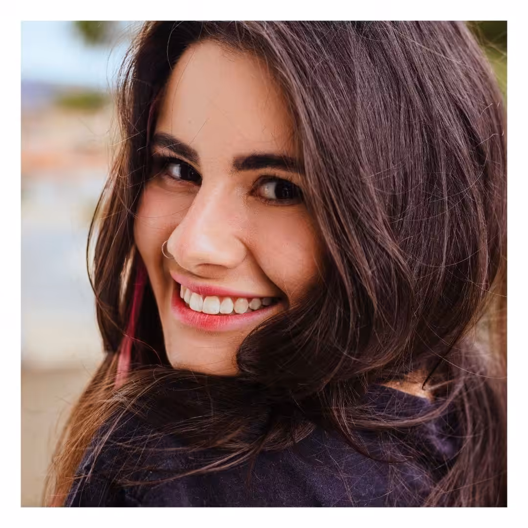tan woman smiling