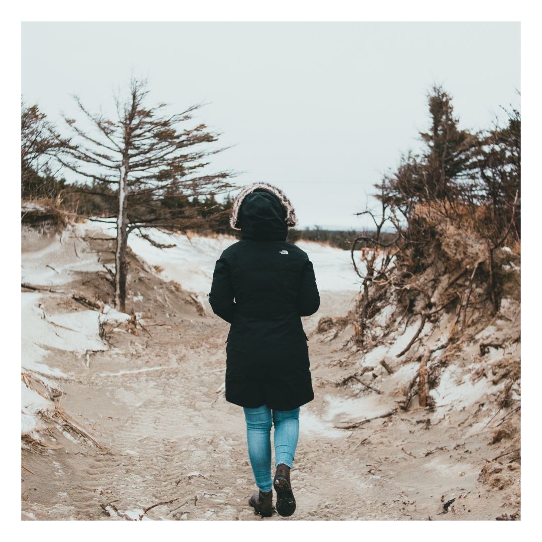 person walking in winter