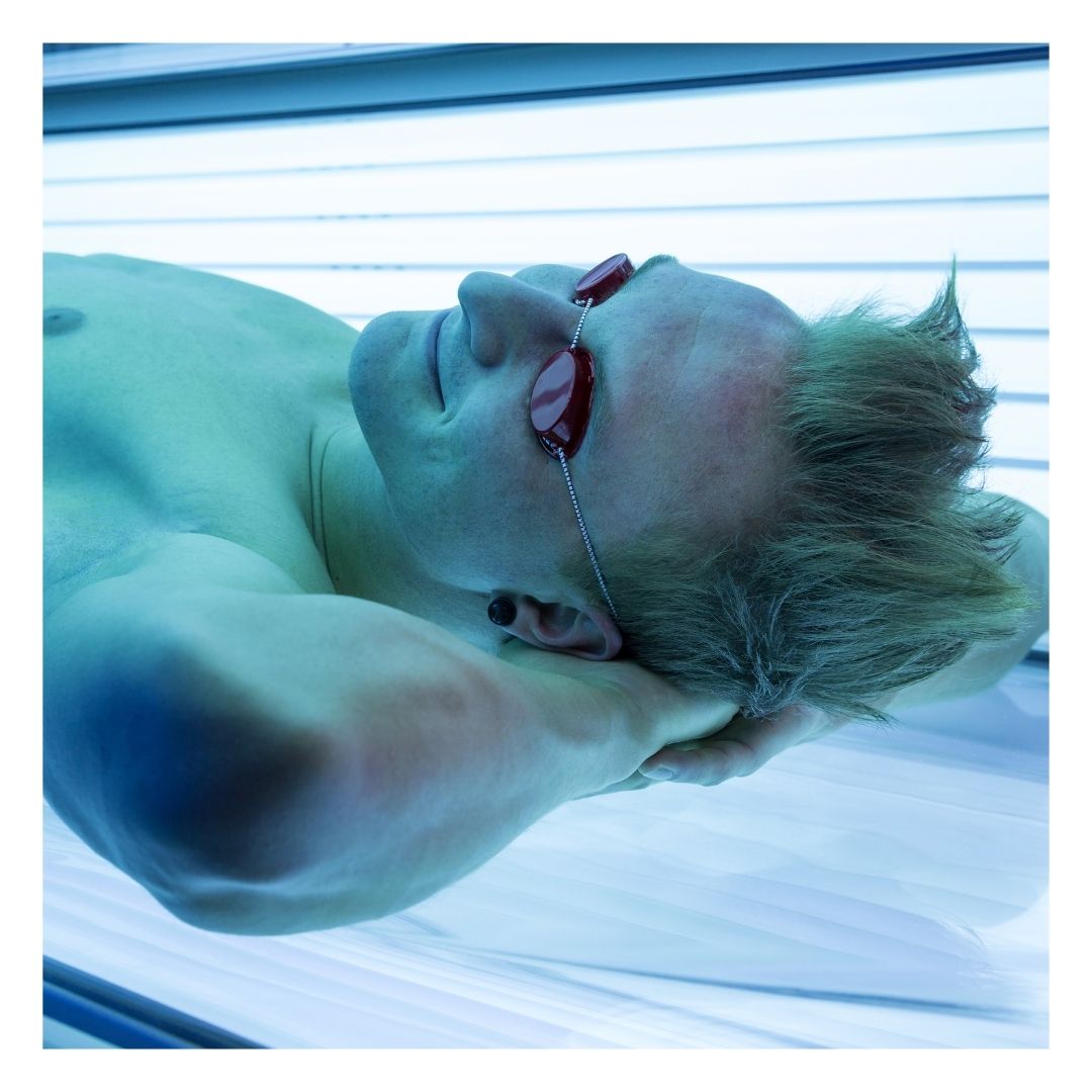 man in a tanning bed