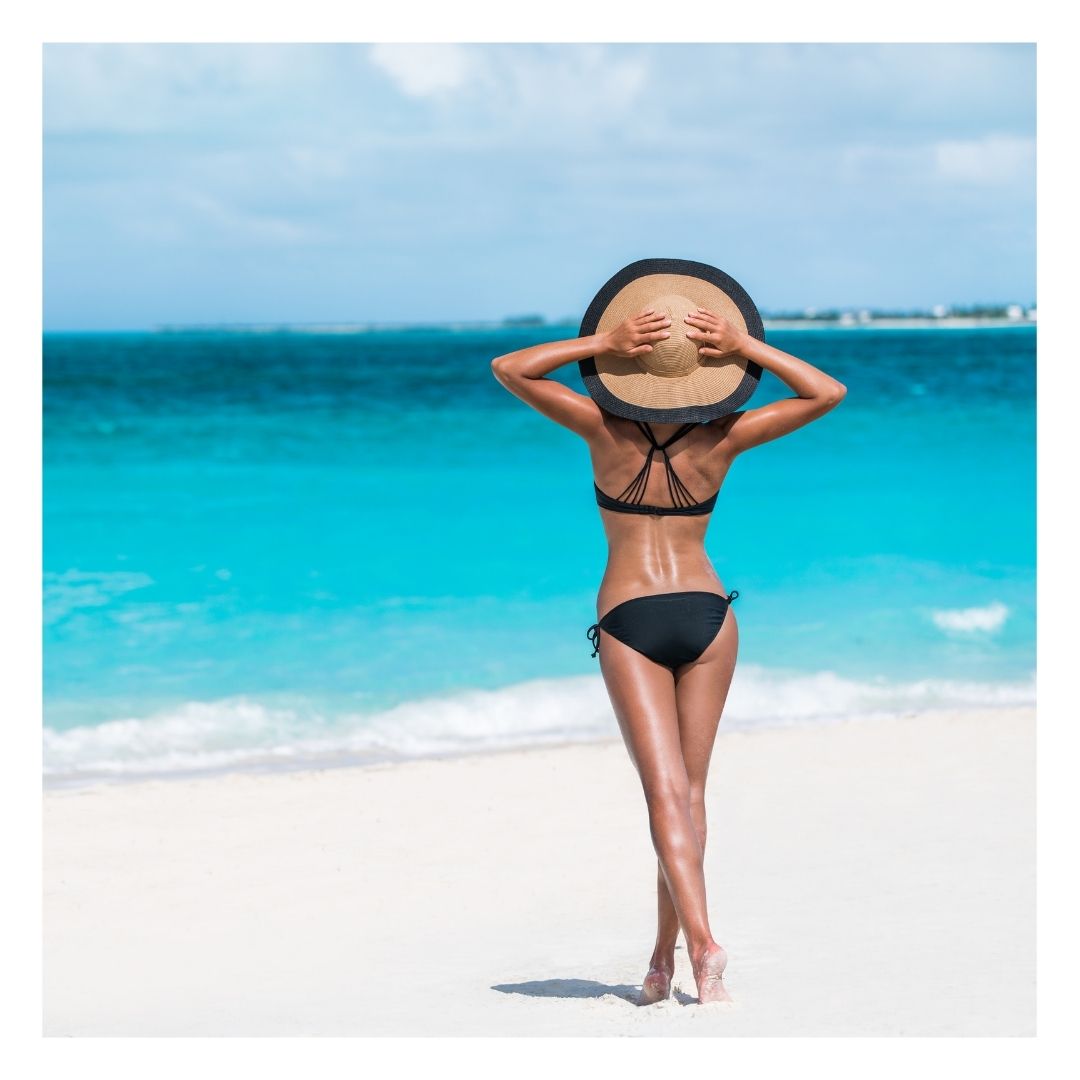 toned woman on the beach
