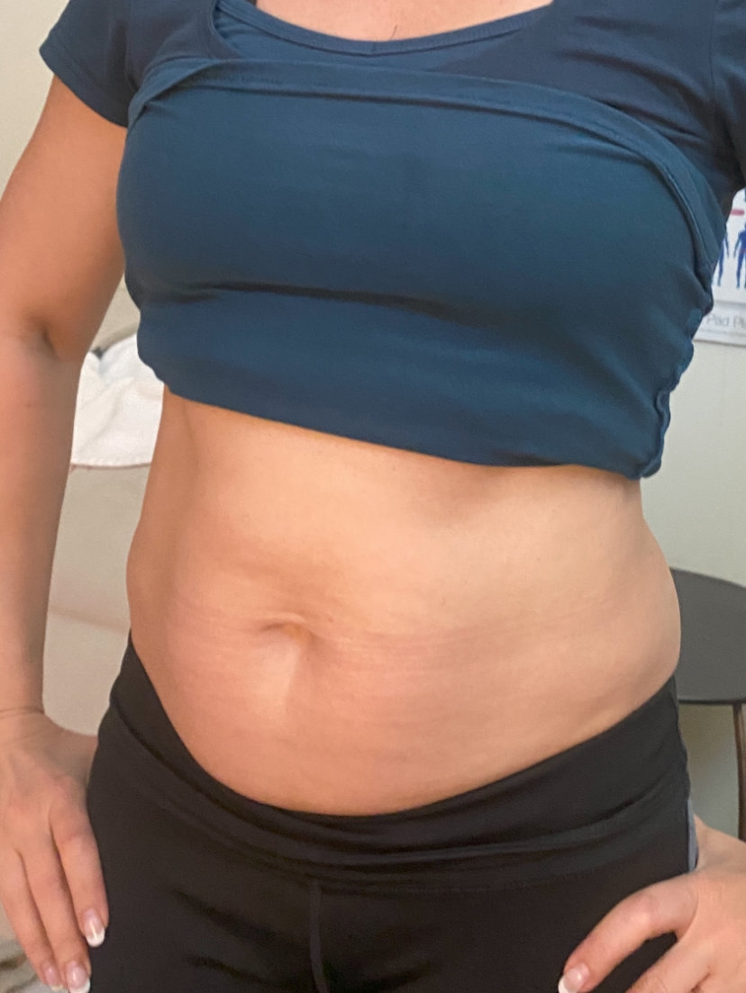 Person in blue crop top and black pants